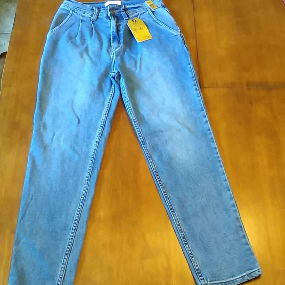 Vibrant M . I . U  jeans Size 7